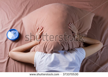 stock-photo-woman-cover-her-head-with-pillow-sleeping-problem-concept-373370530