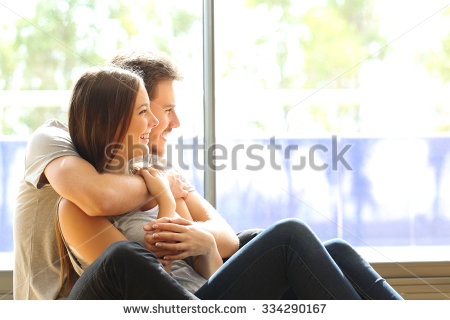 stock-photo-couple-or-marriage-in-his-new-home-looking-through-the-window-334290167