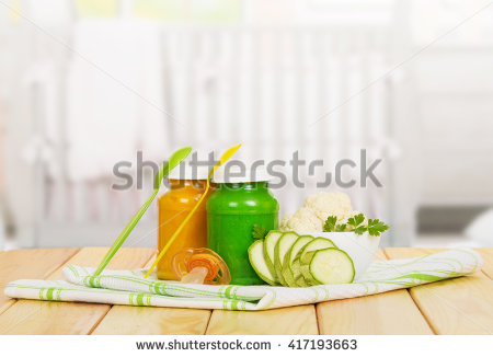 stock-photo-baby-puree-vegetables-cauliflower-zucchini-towels-spoons-and-bimbo-on-a-background-of-light-417193663